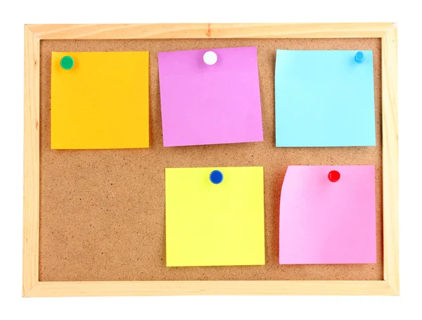 Colorful sticky notes on board isolated on white — Stock Photo, Image