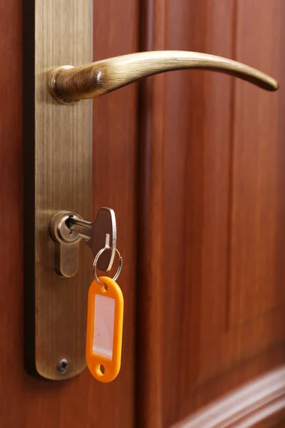 Locking up or unlocking door with key — Stock Photo, Image