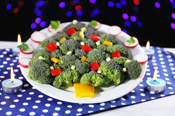 Christmas tree from broccoli on table on dark background — Stock Photo, Image