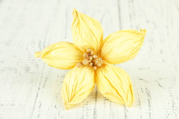 Decorative flower of straw, on wooden background — Stock Photo, Image