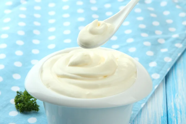 Sour cream on table close-up — Stock Photo, Image