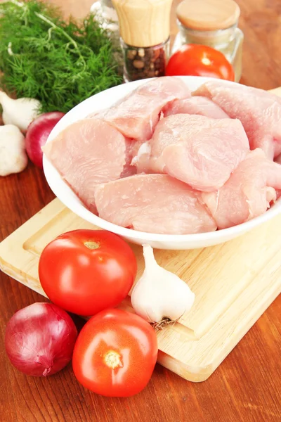 Raw turkey meat on wooden table close up — Stock Photo, Image