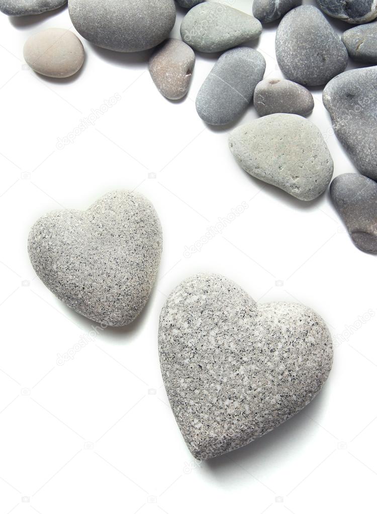 Grey stones in shape of heart, isolated on white