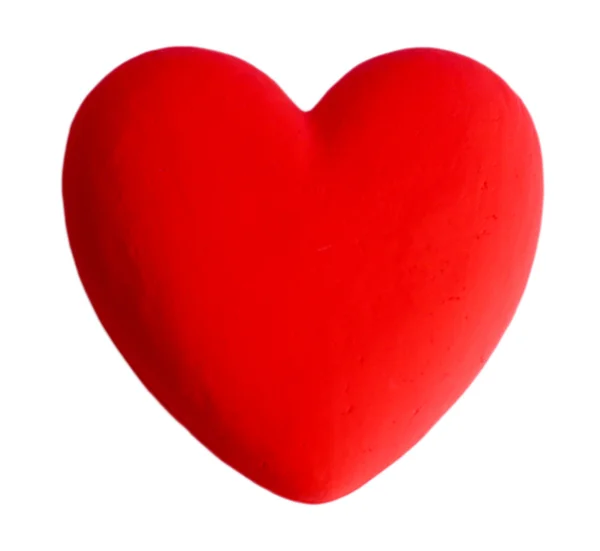 Dekoratives rotes Herz, auf farbigem Hintergrund — Stockfoto