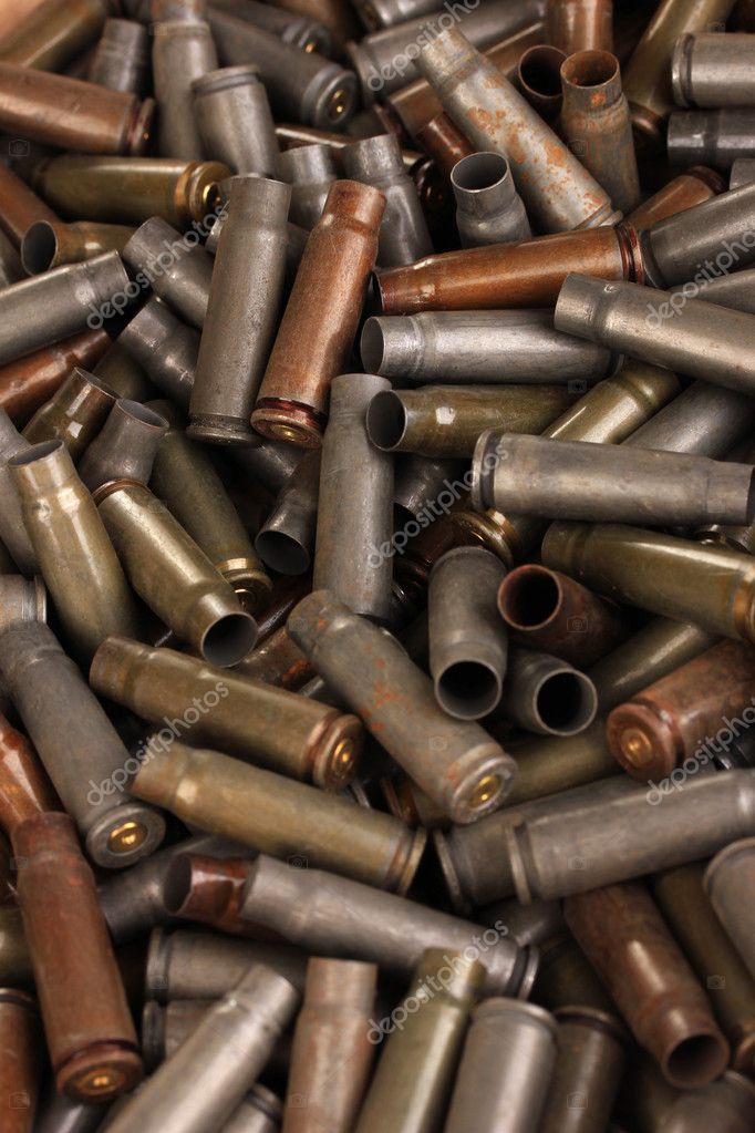 Shotgun cartridges close-up background Stock Photo by ©belchonock 37205723