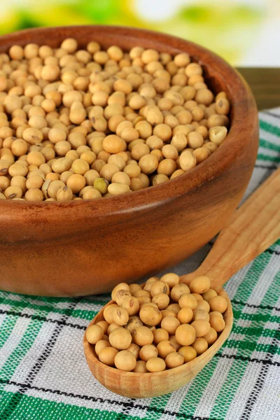 Soy beans on table on bright background — Stock Photo, Image