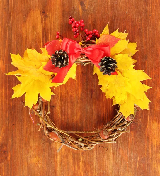 Beautiful Thanksgiving wreath, on wooden background — Stock Photo, Image