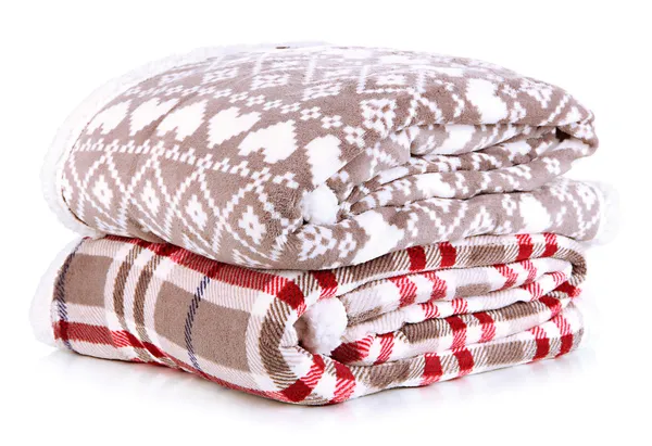 Hromada teplé deky izolovaných na bílém — Stock fotografie
