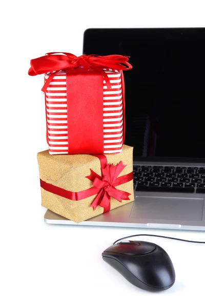 Laptop, gifts and computer mouse isolated on white — Stock Photo, Image