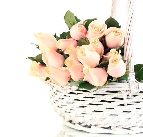 Beautiful bouquet of roses in basket, isolated on white — Stock Photo, Image