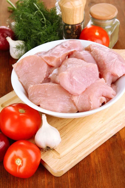 Raw turkey meat on wooden table close up — Stock Photo, Image