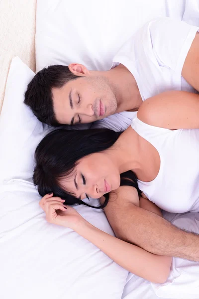 Couple in love sleeping in bed — Stock Photo, Image