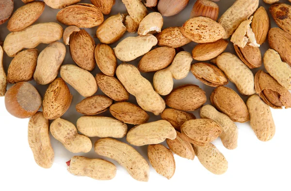 Many nuts close-up isolated on white — Stock Photo, Image