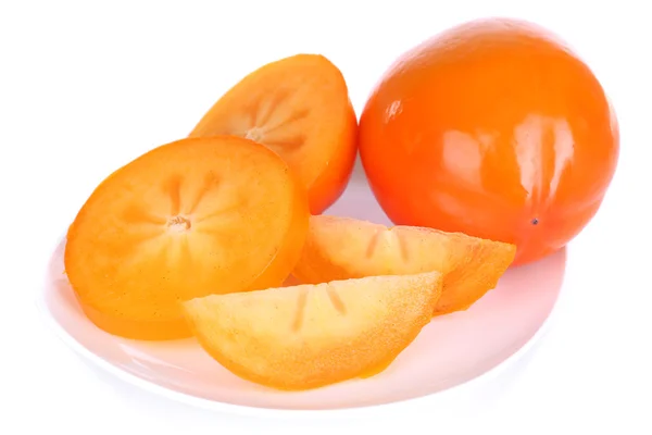 Dojrzałe persimmons na płytkę na białym tle — Zdjęcie stockowe