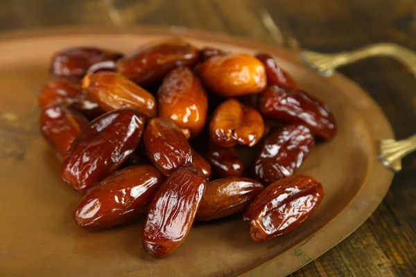 Conceptual photo of Ramadan food:dates palm on tray — Stock Photo, Image