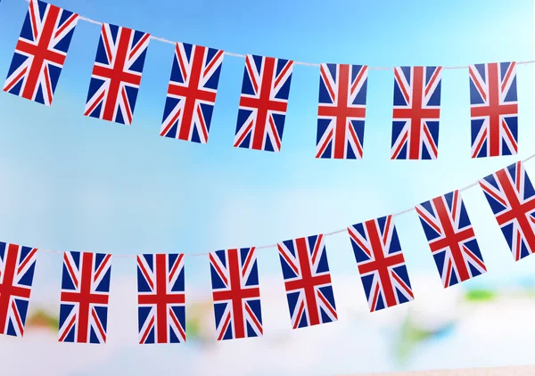 Garland of flags on bright background — Stock Photo, Image