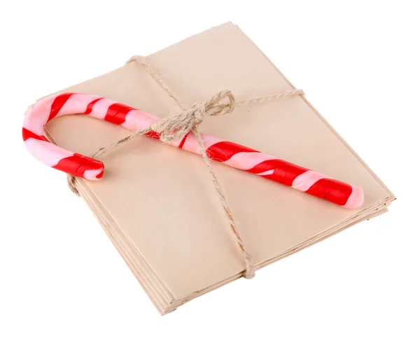 Canne à bonbons de Noël et lettres pour le Père Noël, isolé sur blanc — Photo