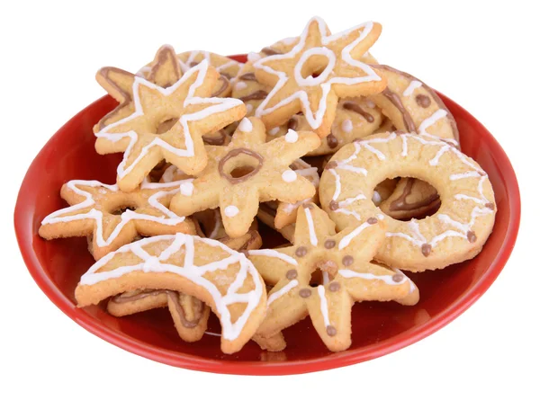Deliciosos biscoitos de Natal na placa isolada em branco — Fotografia de Stock