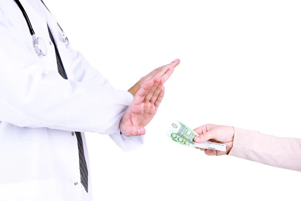 Médico masculino recebendo dinheiro do paciente, isolado em branco — Fotografia de Stock