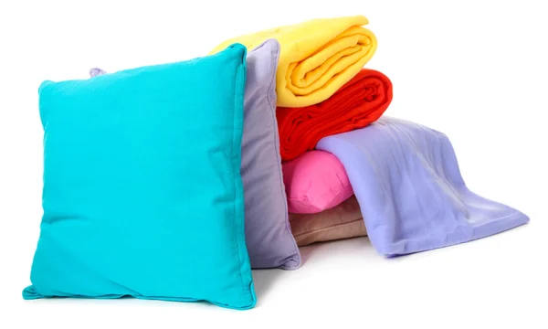 Travesseiros e travesseiros brilhantes, isolados sobre branco — Fotografia de Stock