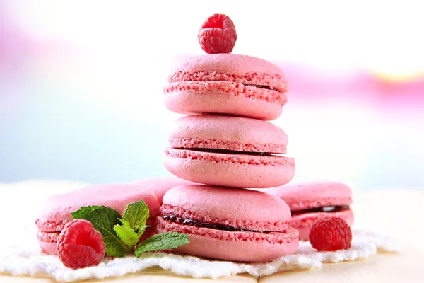 Gentle macaroons on table on light background — Stock Photo, Image