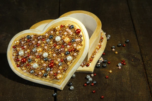 Beautiful hand made casket, on wooden background — Stock Photo, Image