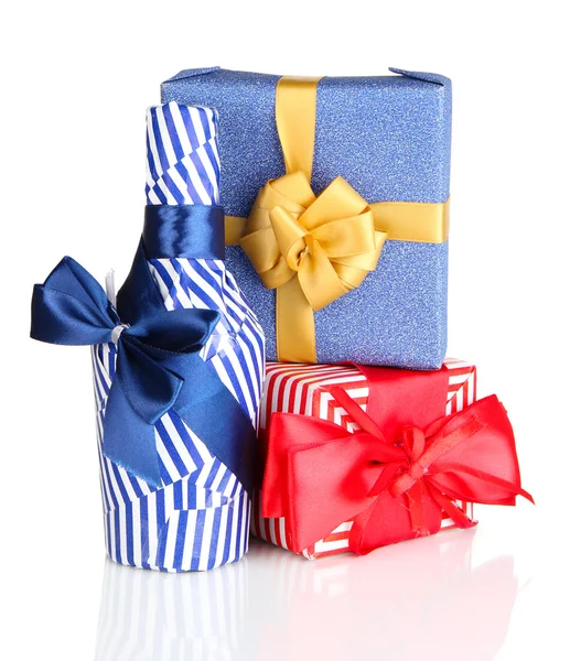 Bottle packed in gift paper with gifts isolated on white — Stock Photo, Image