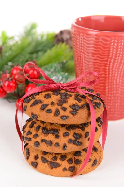 Biscoitos doces com xícara de chá na mesa close-up — Fotografia de Stock