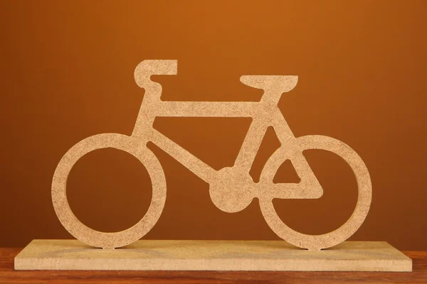 Decorative bicycle on brown background — Stock Photo, Image