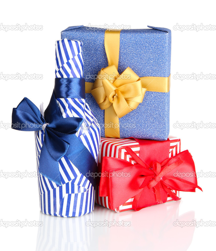 Bottle packed in gift paper with gifts isolated on white