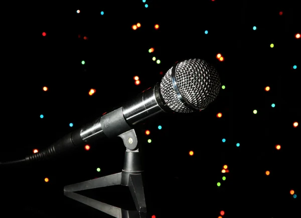 Microphone on stand on bright background — Stock Photo, Image