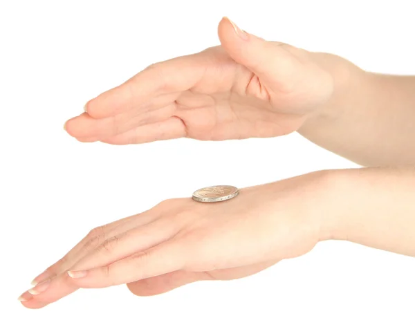 Mãos de mulher lançando moeda isolada em branco — Fotografia de Stock