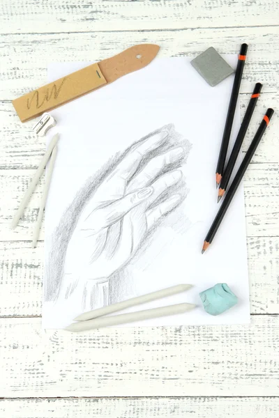 Professional art materials and sketch, on wooden table — Stock Photo, Image