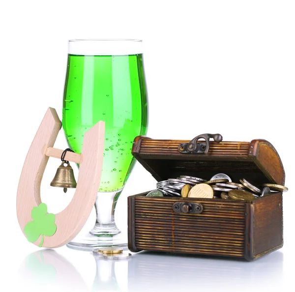 Glass of green beer and chest with coins isolated on white — Stock Photo, Image