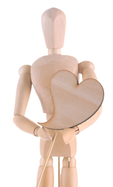 Wooden mannequin holding heart isolated on white — Stock Photo, Image