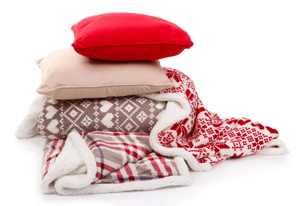 Warm plaids and pillows isolated on white — Stock Photo, Image