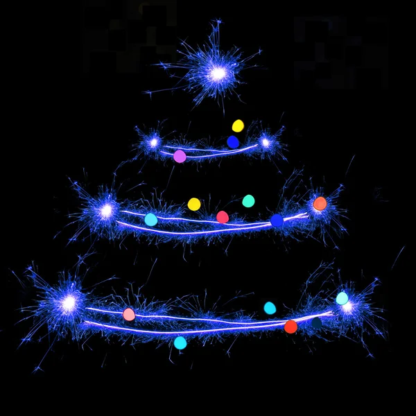 Sparklers in Christmas tree-shaped — Stock Photo, Image