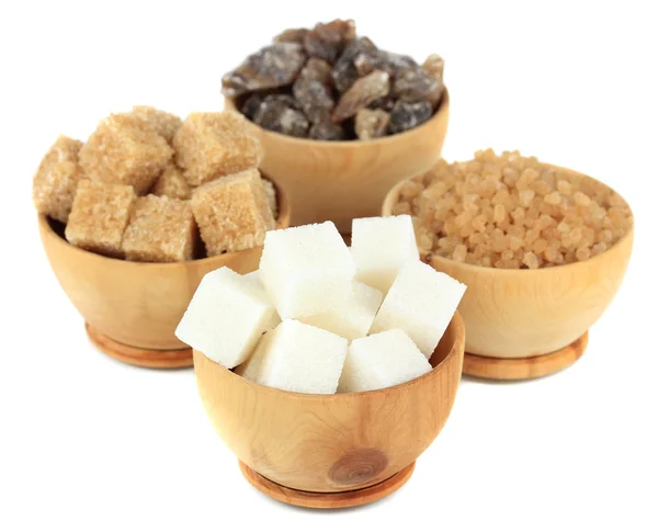 Verschillende soorten suiker in kommen geïsoleerd op wit — Stockfoto