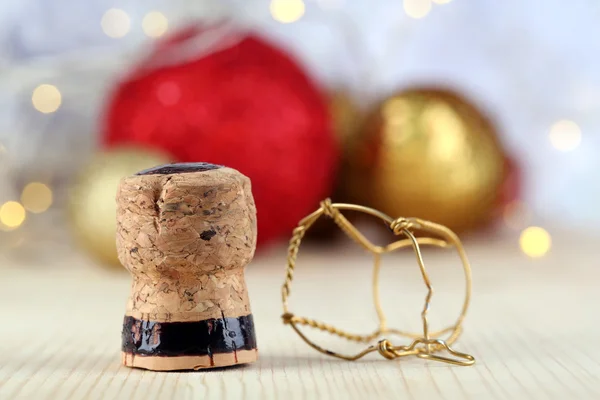 Noel ışıkları zemin üzerine şampanya mantar — Stok fotoğraf
