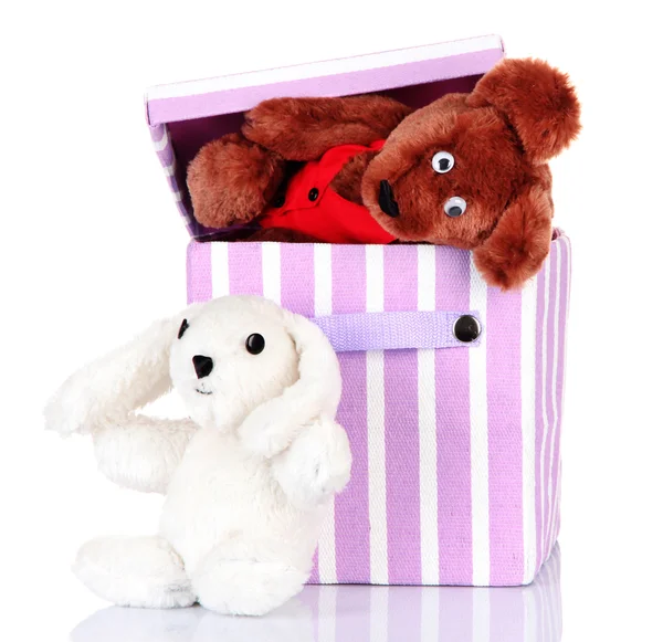Textilbox mit Spielzeug, isoliert auf weiß — Stockfoto