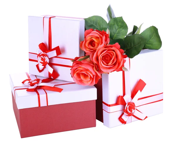 Beautiful gift boxes with flowers isolated on white — Stock Photo, Image