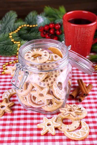 Delicious Christmas cookies in jar on table close-up — Stock Photo, Image