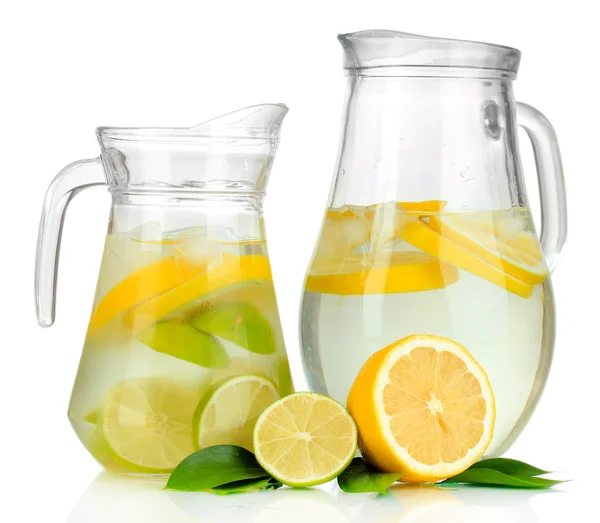 Cold water with lime, lemon and ice in pitchers isolated on white — Stock Photo, Image