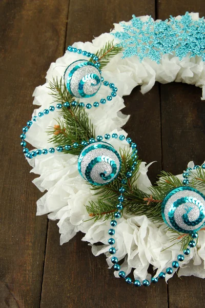 Christmas wreath on wooden background — Stock Photo, Image