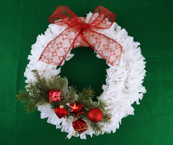 Christmas wreath on fabric background — Stock Photo, Image