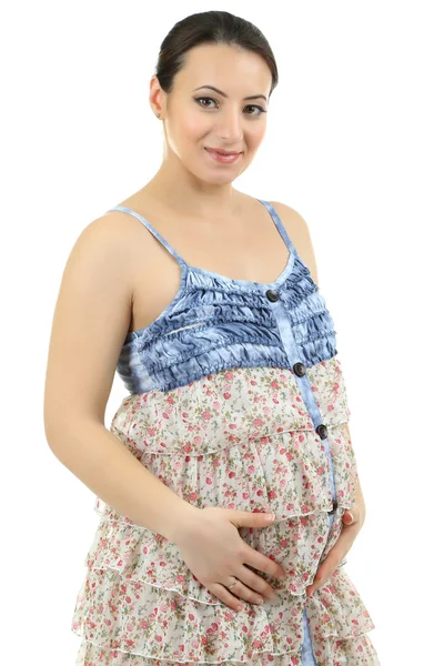Mulher grávida bonita tocando sua barriga isolada no branco — Fotografia de Stock