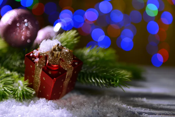 Christmas decorations on wooden table, on bright background — Stock Photo, Image