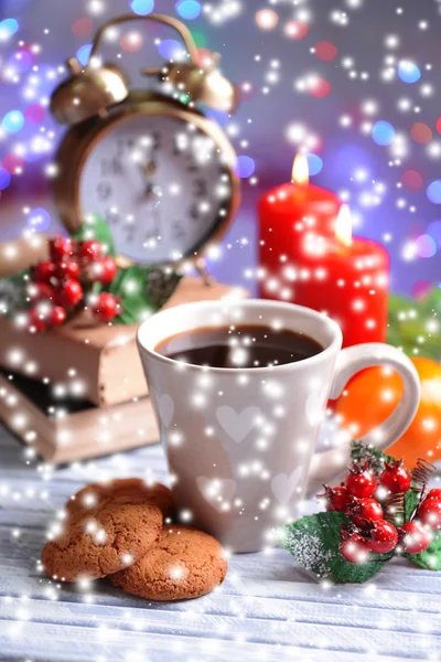 Composition of book with cup of coffee and Christmas decorations on table on bright background — Stock Photo, Image