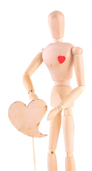 Wooden mannequin with heart isolated on white — Stock Photo, Image
