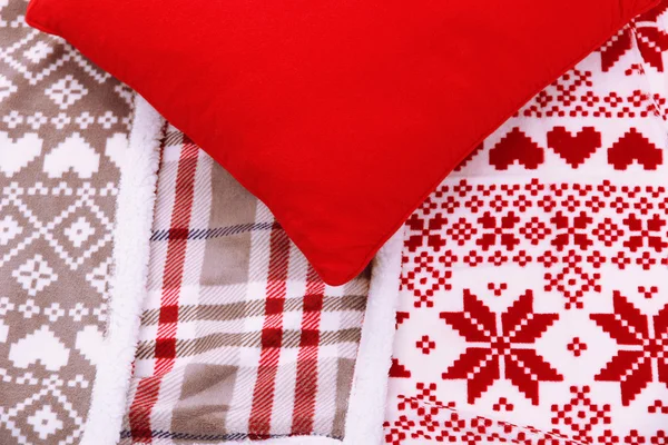 暖かいチェック模様と枕のクローズ アップの背景 — ストック写真